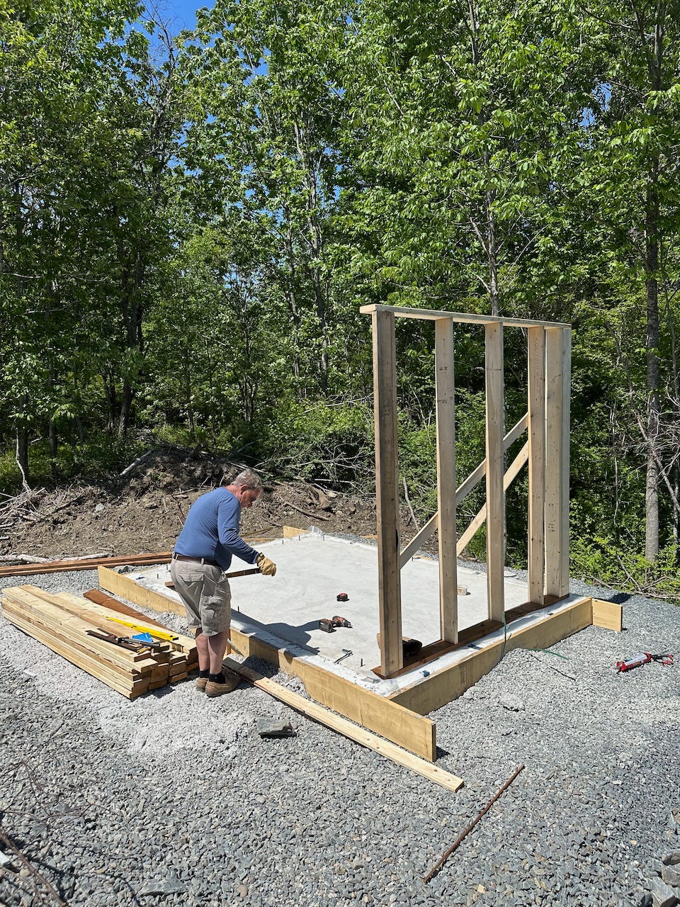 My uncle Ian helping out on the small shed framing