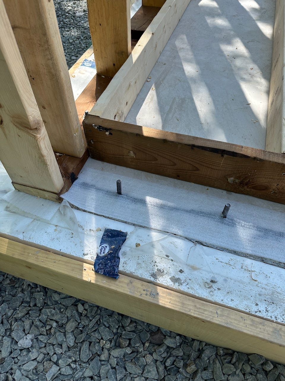 Here you can see the foam sill gasket, with a layer of acoustic sealant underneath (another will be added on top before the w