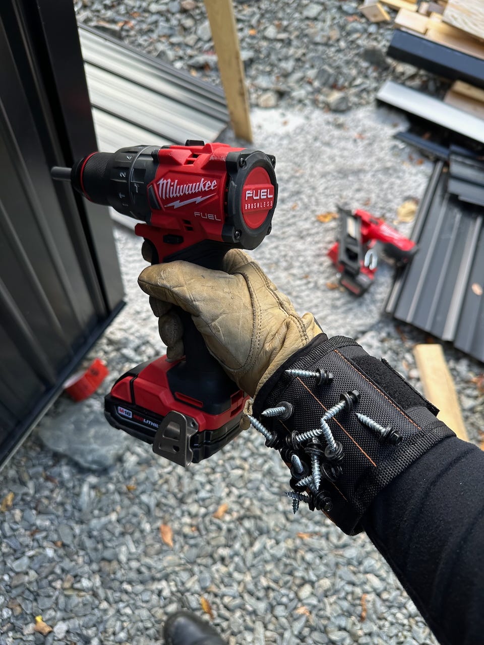 Magnetic wristband holding screws during solo building work