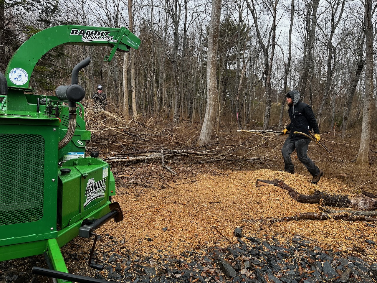 Wet lugging of brush to be fed into the chipper